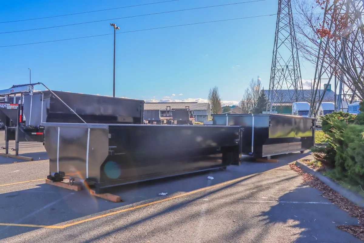 Roll-off dumpster ready for waste disposal at job site for 2 Yard Dumpster Rental in Timberlake